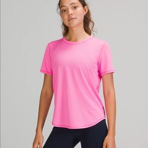 Lululemon high-neck running and training t-shirt in pow pink light.